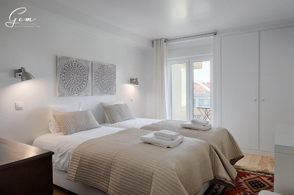 Postel nebo postele na pokoji v ubytování Seven Rivers Luxury Apartment