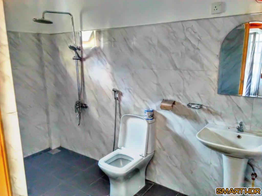 Koupelna v ubytování Chithra Homestay