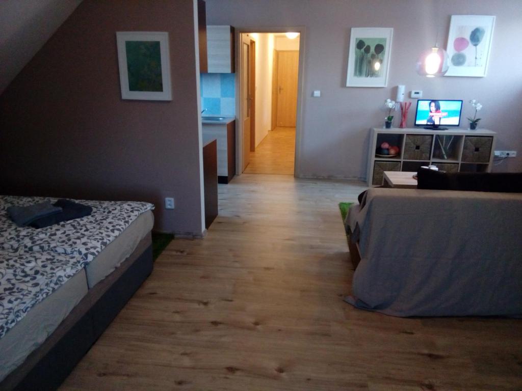 Postel nebo postele na pokoji v ubytování Hostinské pokoje U Kulináře
