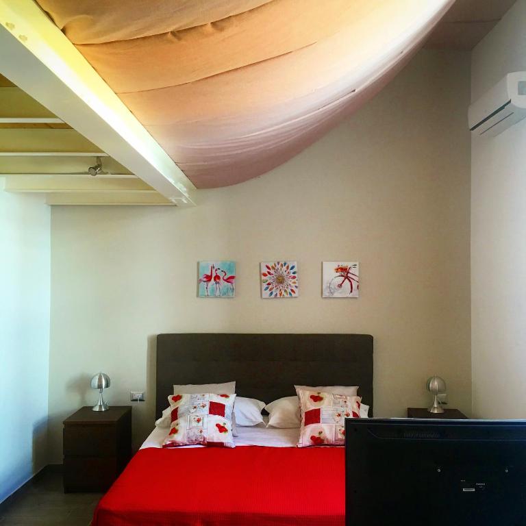Posteľ alebo postele v izbe v ubytovaní EmyJo Central B&B