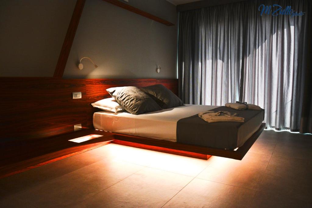 A bed or beds in a room at B&B Rakel Home