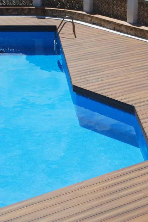 Bazén v ubytování Hotel Sa Riera nebo v jeho okolí
