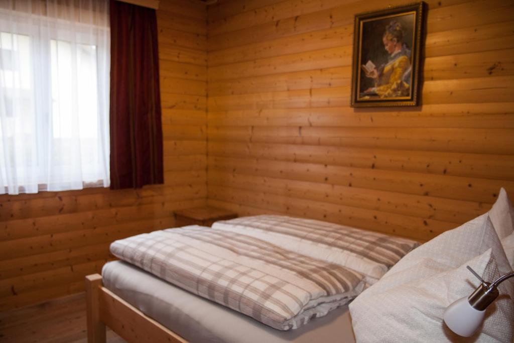 Posteľ alebo postele v izbe v ubytovaní Chalet an der Traun