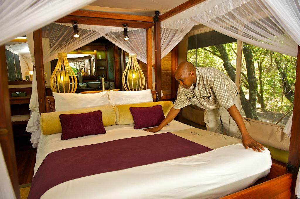 Postel nebo postele na pokoji v ubytování Mara Intrepids Tented Camp