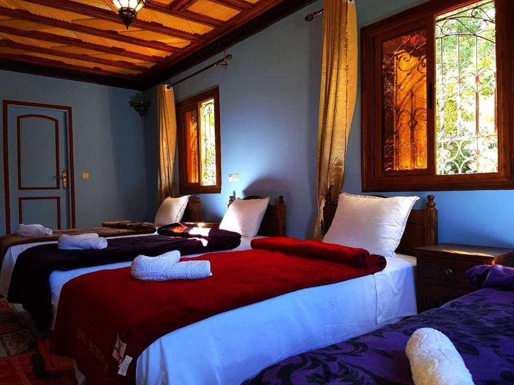 Una cama o camas en una habitación de Atlas Imoula