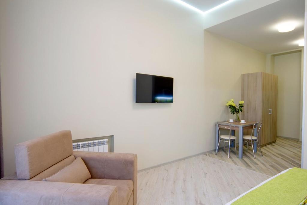 TV a/nebo společenská místnost v ubytování Summit Apart Hotel