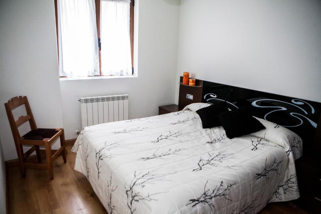 Postel nebo postele na pokoji v ubytování Casa Rural Tolareta