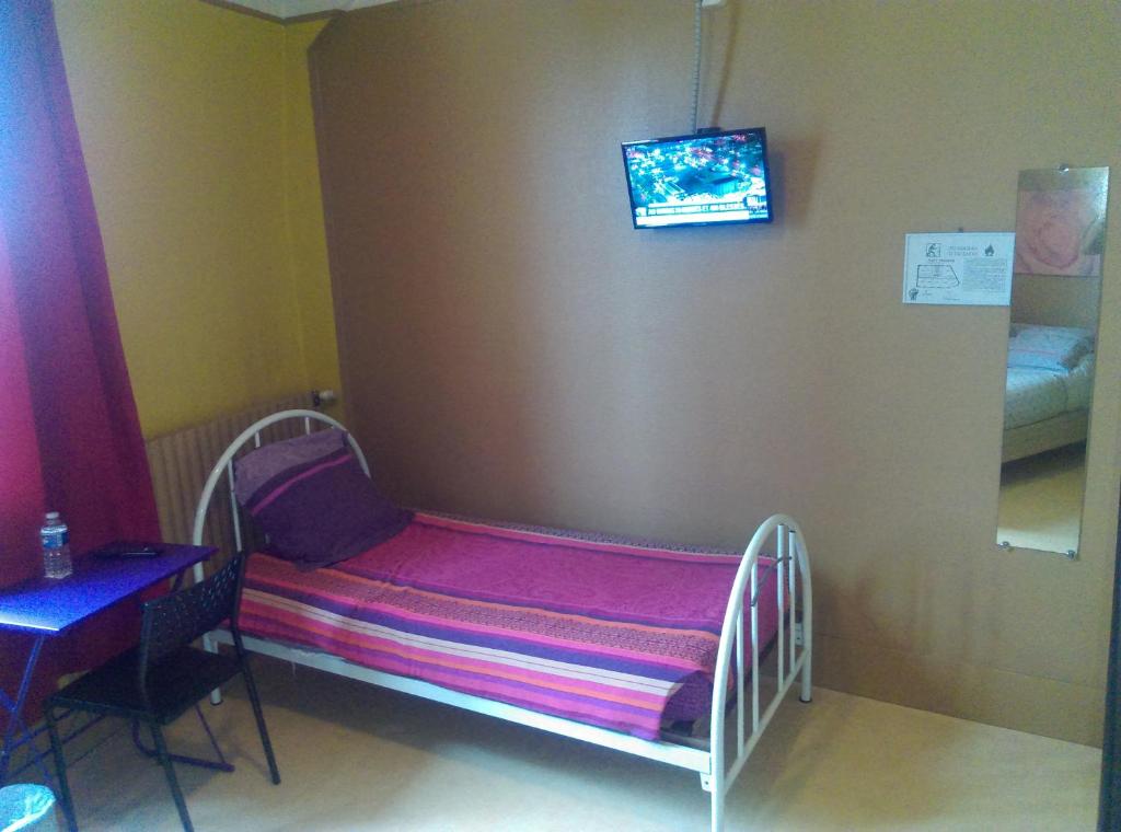 TV a/nebo společenská místnost v ubytování Hotel le Rallye