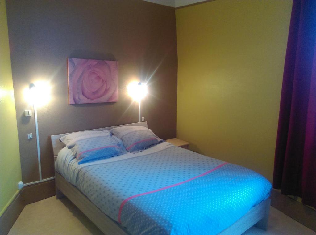 Postel nebo postele na pokoji v ubytování Hotel le Rallye