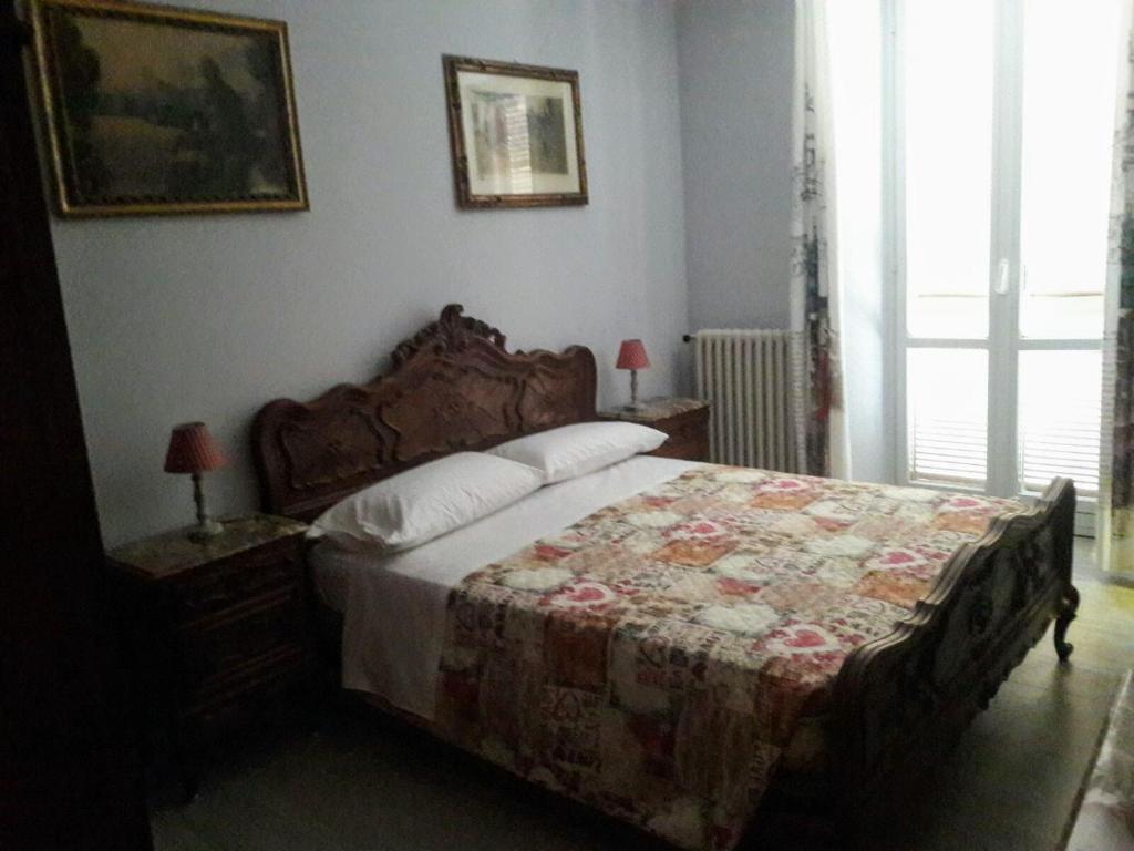 Postel nebo postele na pokoji v ubytování Le camere di Gio