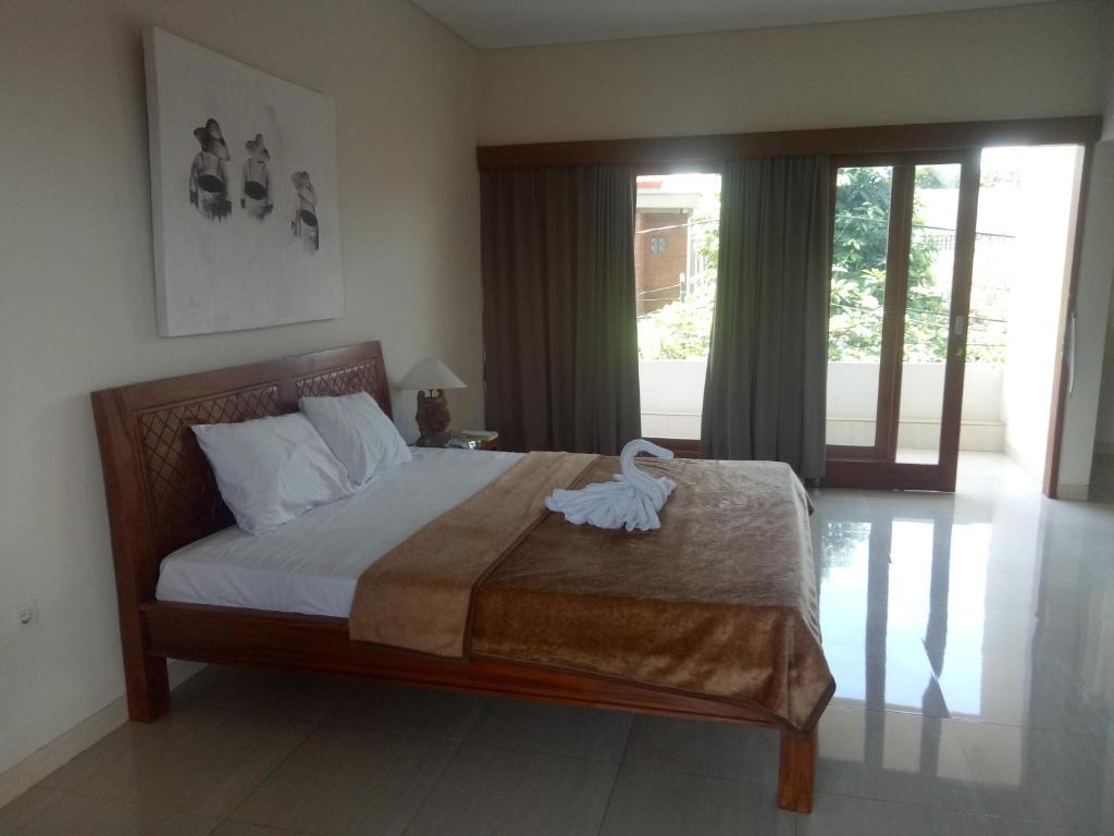 Postel nebo postele na pokoji v ubytování Karta House