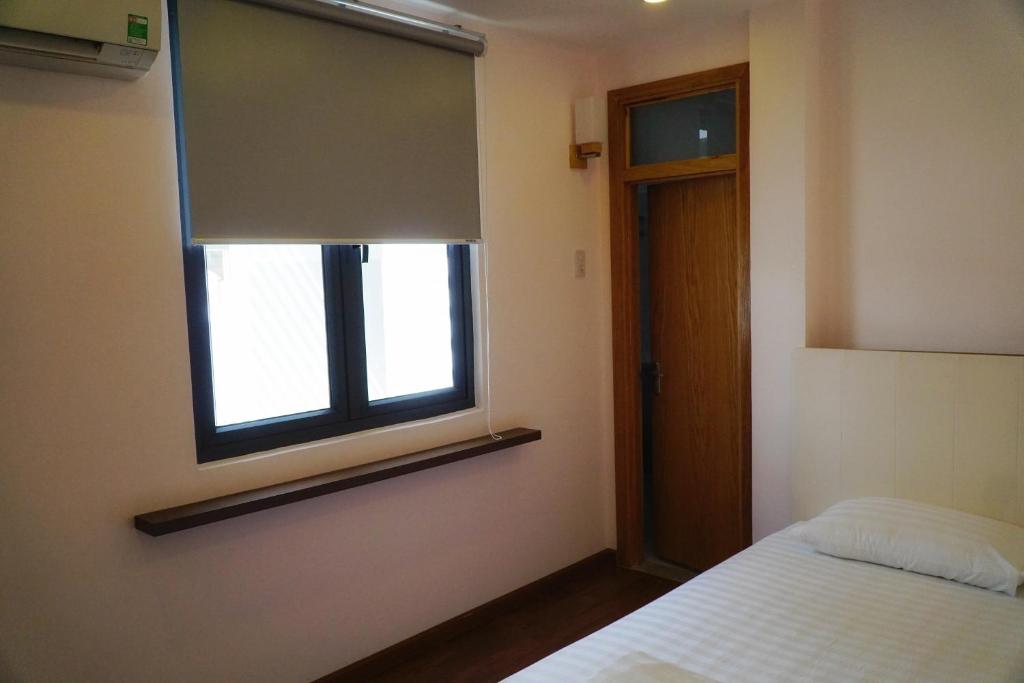 Giường trong phòng chung tại The Alley Hostel