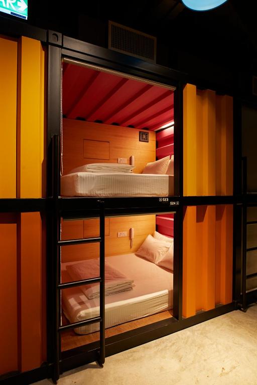 Letto o letti in una camera di CapsuleTransit Landside - Airport Hotel - Public Area - Gateway KLIA T2, Lvl 1
