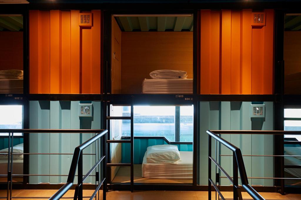 Letto o letti in una camera di CapsuleTransit Landside - Airport Hotel - Public Area - Gateway KLIA T2, Lvl 1