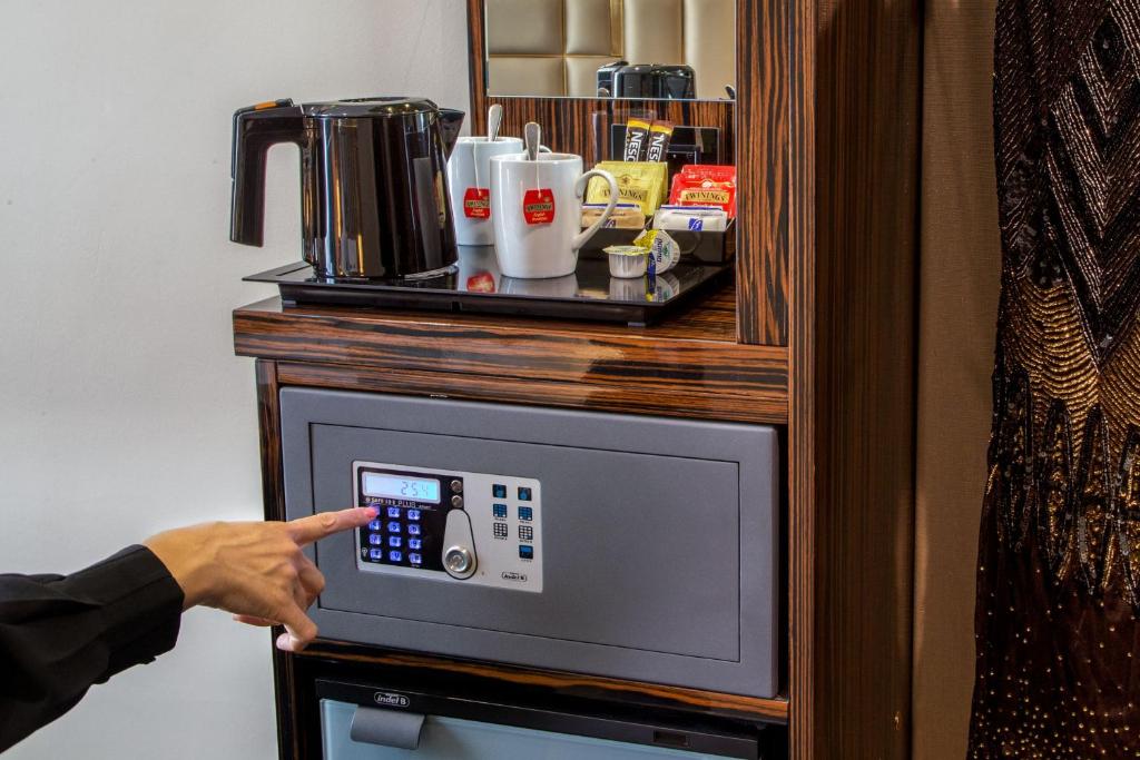 Kuchyň nebo kuchyňský kout v ubytování Hotel Gioberti