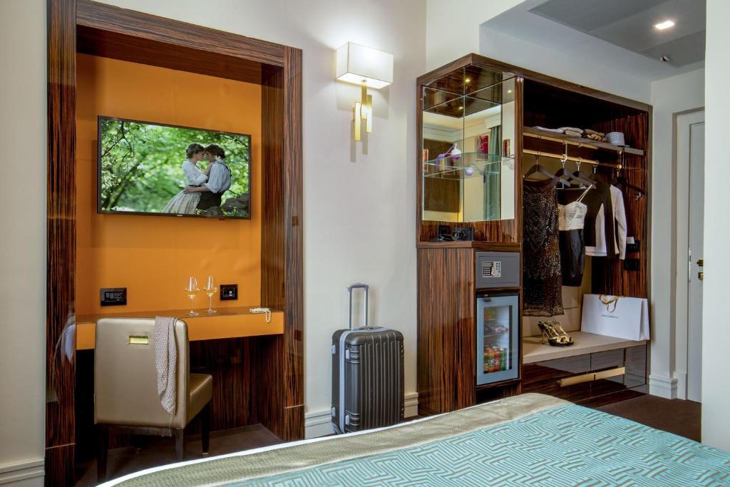 TV a/nebo společenská místnost v ubytování Hotel Gioberti