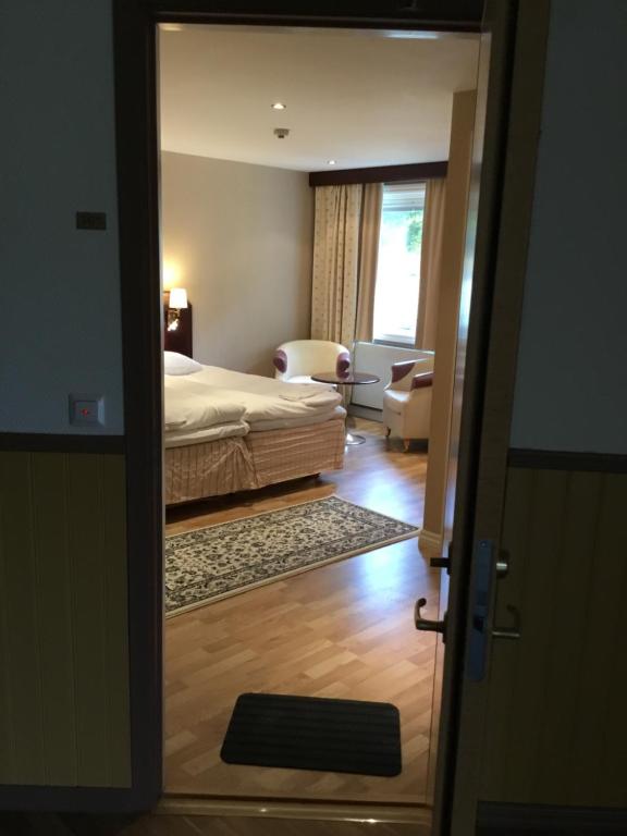 Postel nebo postele na pokoji v ubytování Dagsholm Hotell