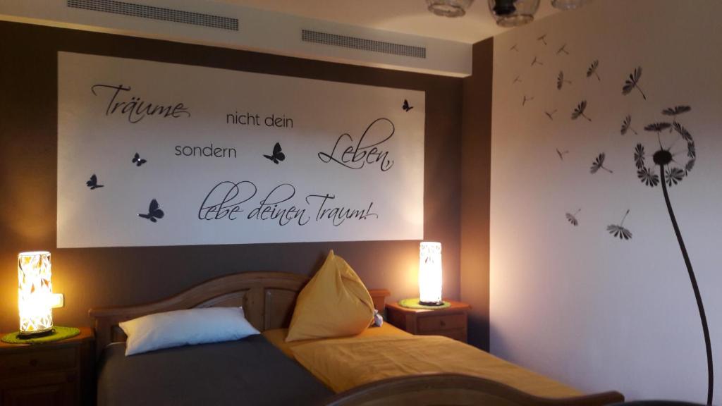 Postel nebo postele na pokoji v ubytování Ferienhaus Planetz