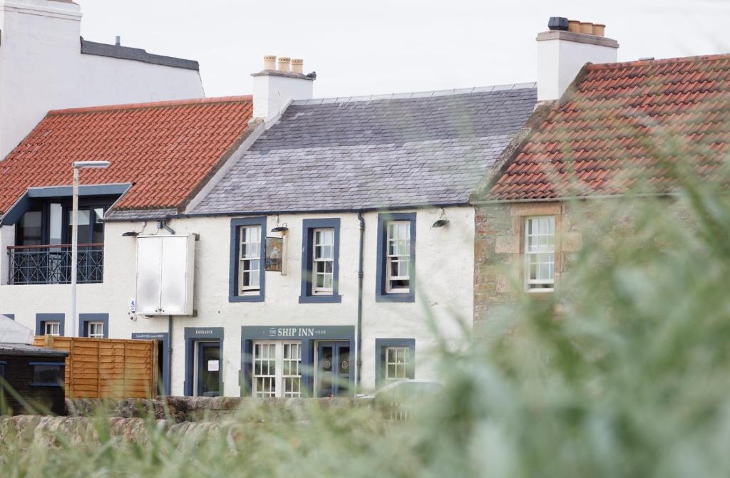 a group of houses with red roofs at The Ship Inn in Elie