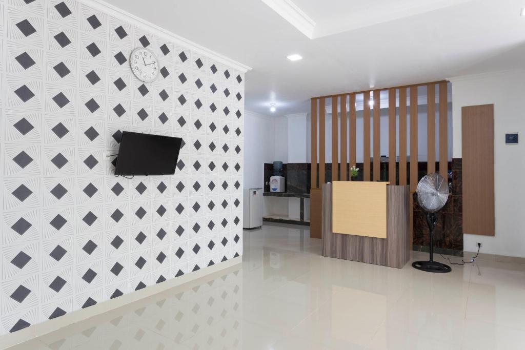 TV a/nebo společenská místnost v ubytování RedDoorz Plus @ Boulevard Residence BSD