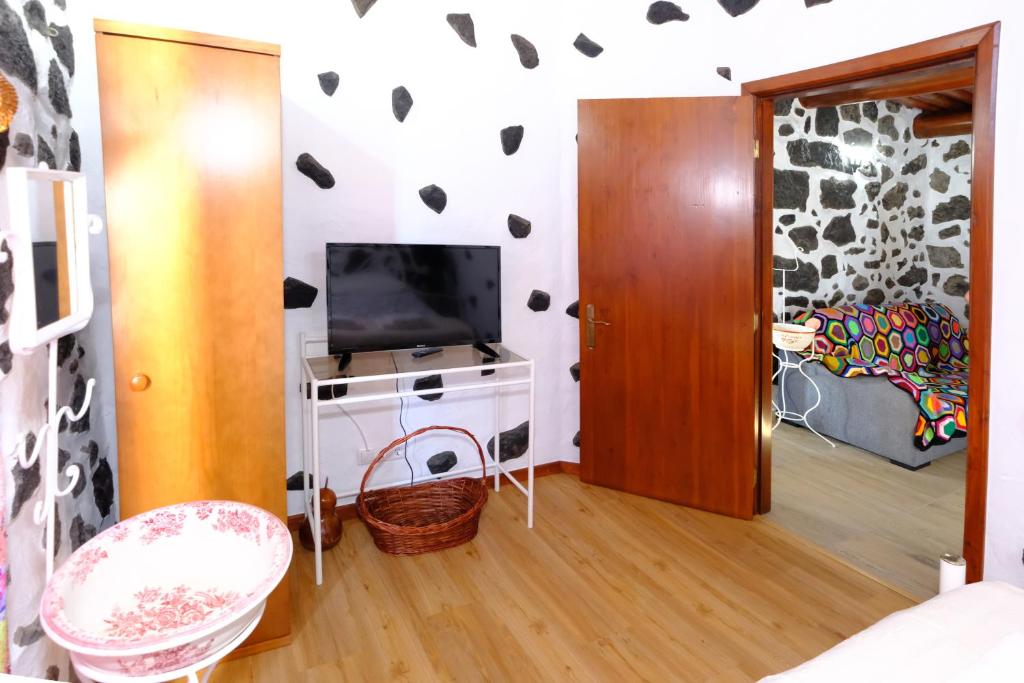 TV a/nebo společenská místnost v ubytování Quinta do Fragoso