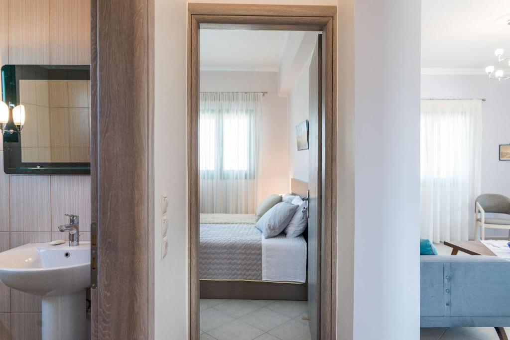 A bed or beds in a room at Villa Kampos