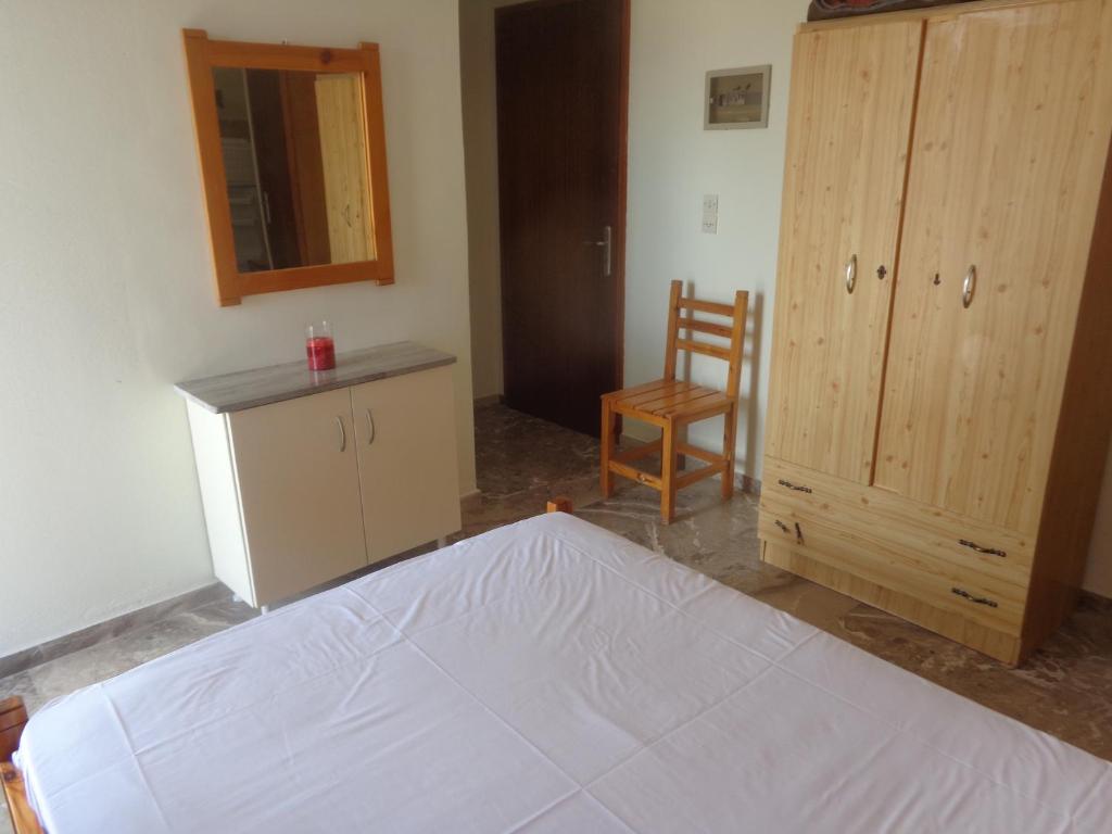 Postel nebo postele na pokoji v ubytování Finikas