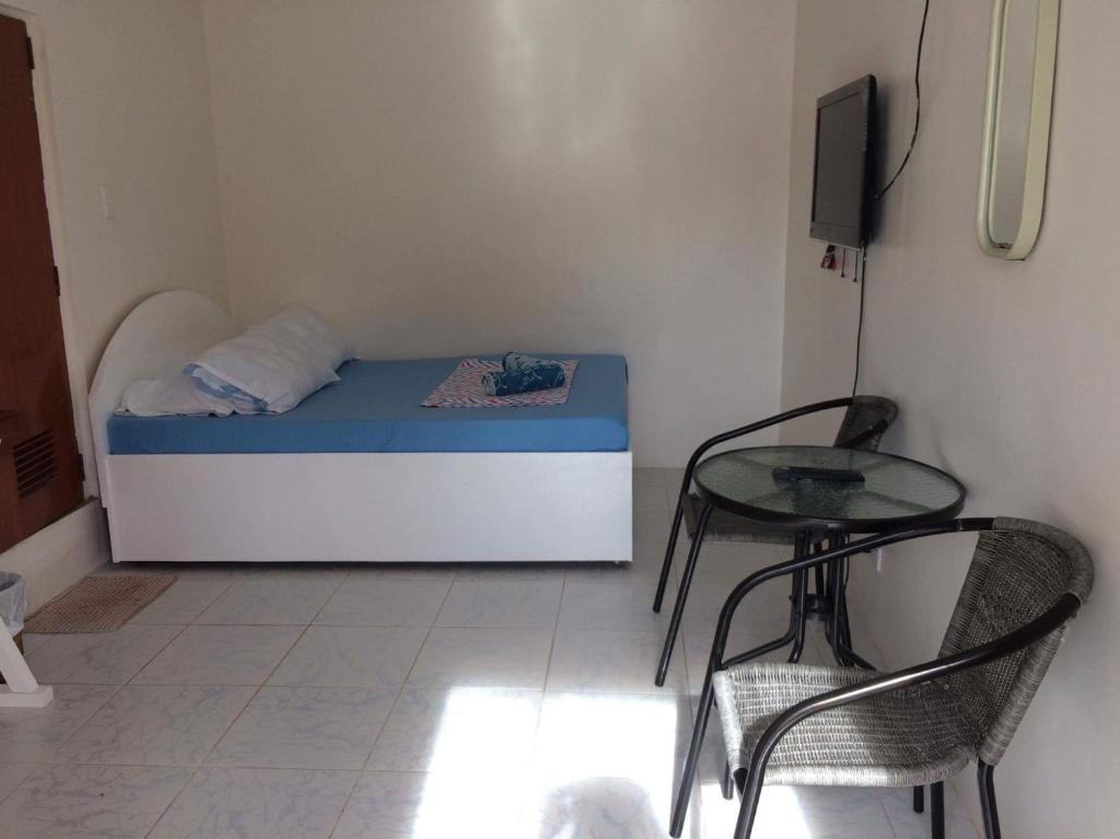 Postel nebo postele na pokoji v ubytování InnBox Bed & Bath