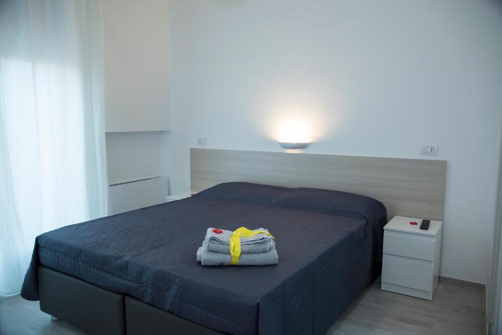 Posteľ alebo postele v izbe v ubytovaní Al Duomo B&B