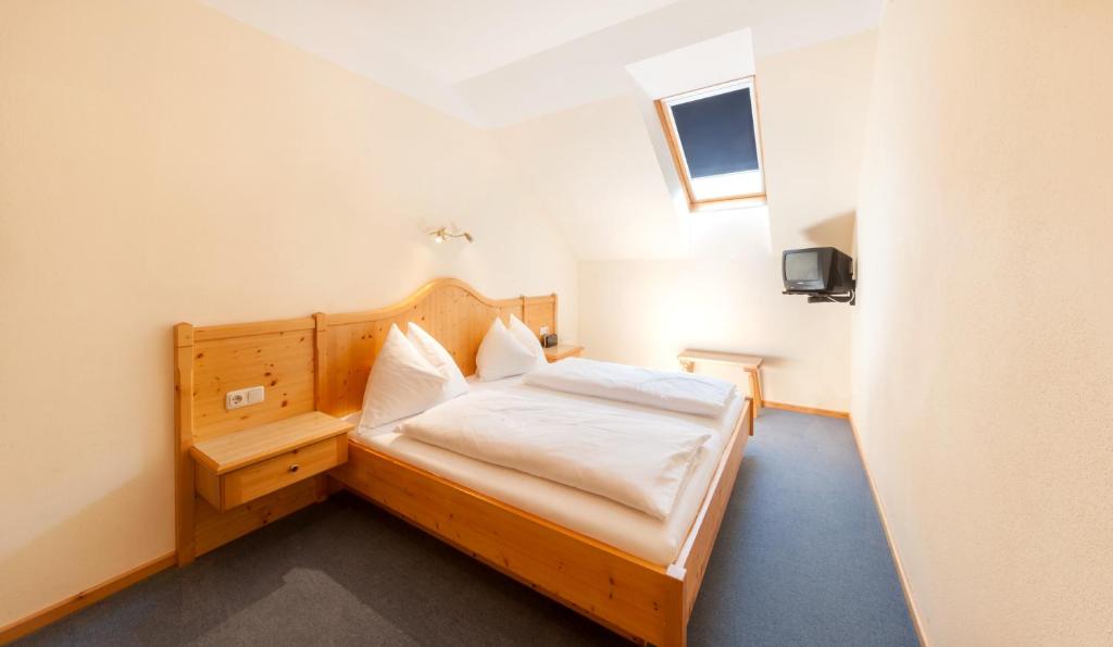Postel nebo postele na pokoji v ubytování Haus Wolfgangsee