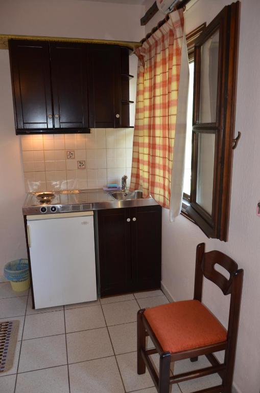 Kuchyň nebo kuchyňský kout v ubytování Hotel Maria