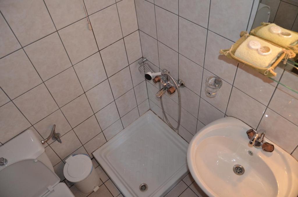 Koupelna v ubytování Hotel Maria