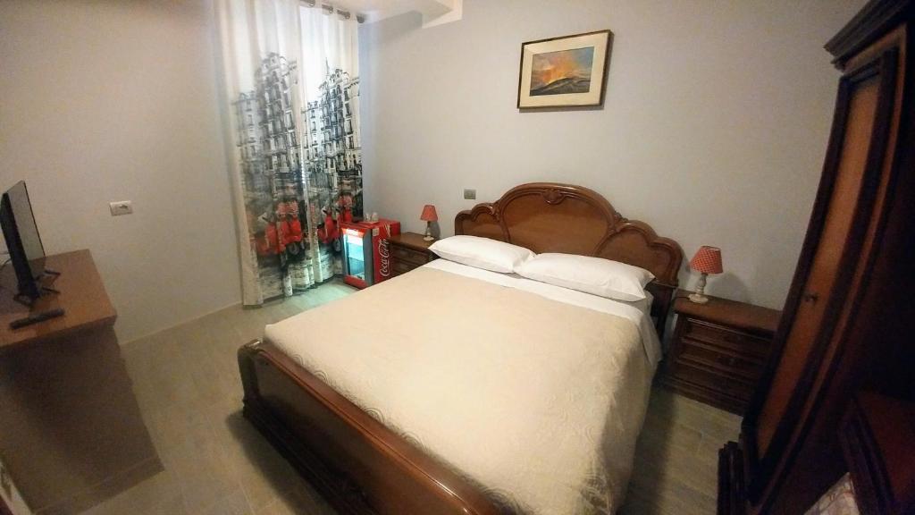 Postel nebo postele na pokoji v ubytování Le camere di Gio