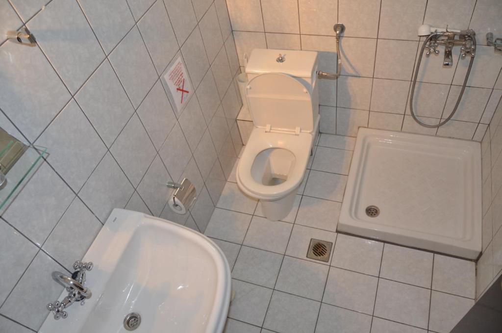 Koupelna v ubytování Hotel Maria