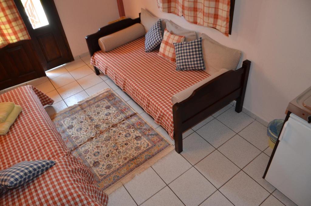 Postel nebo postele na pokoji v ubytování Hotel Maria