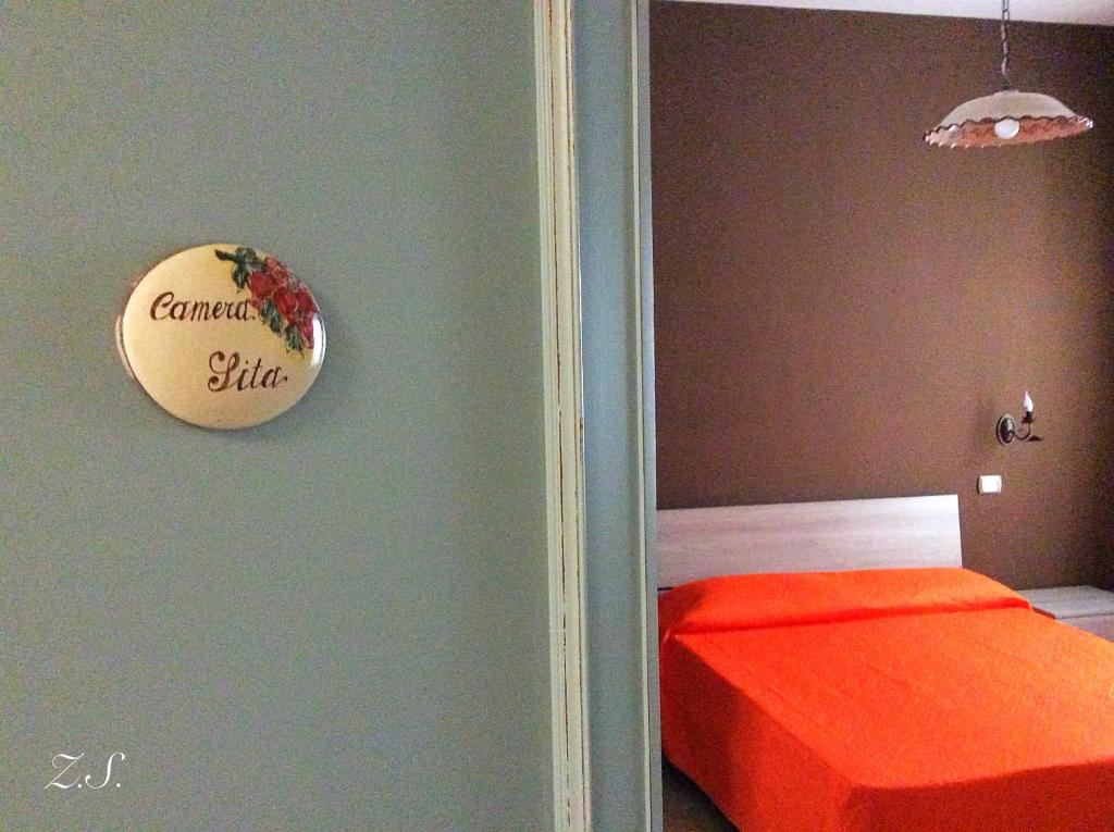Łóżko lub łóżka w pokoju w obiekcie ZeroSalento Casa Vacanze