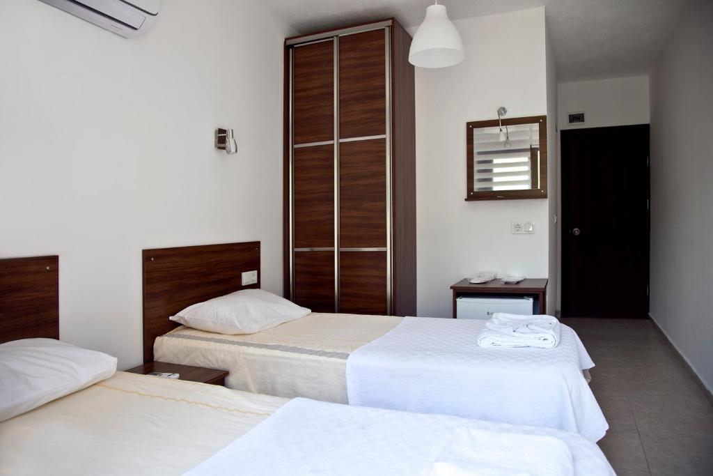 Postel nebo postele na pokoji v ubytování Şahin Motel & Restaurant
