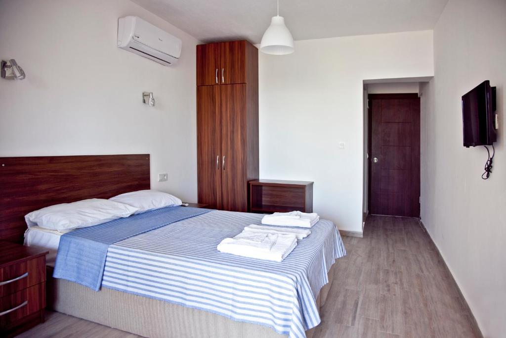 Postel nebo postele na pokoji v ubytování Şahin Motel & Restaurant