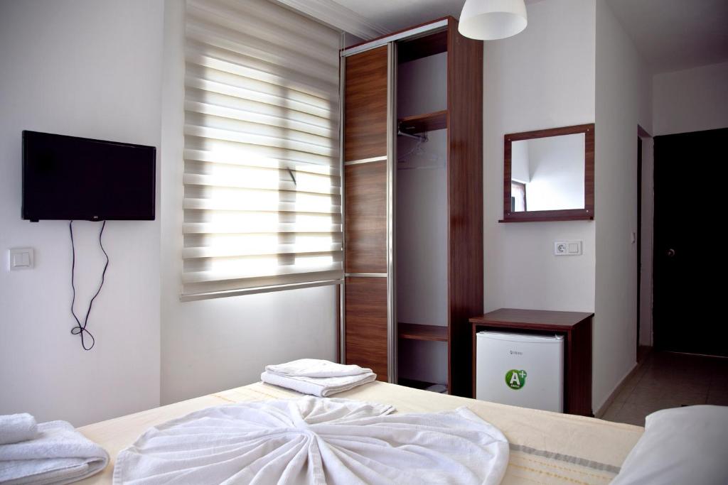 Postel nebo postele na pokoji v ubytování Şahin Motel & Restaurant
