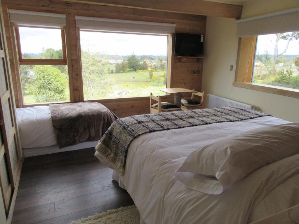Postel nebo postele na pokoji v ubytování Casa Bosque Chiloé