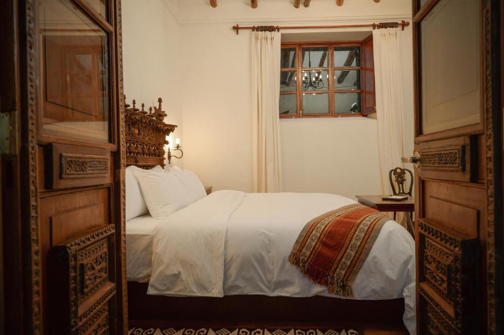 Postel nebo postele na pokoji v ubytování Palacio Manco Capac by Ananay Hotels