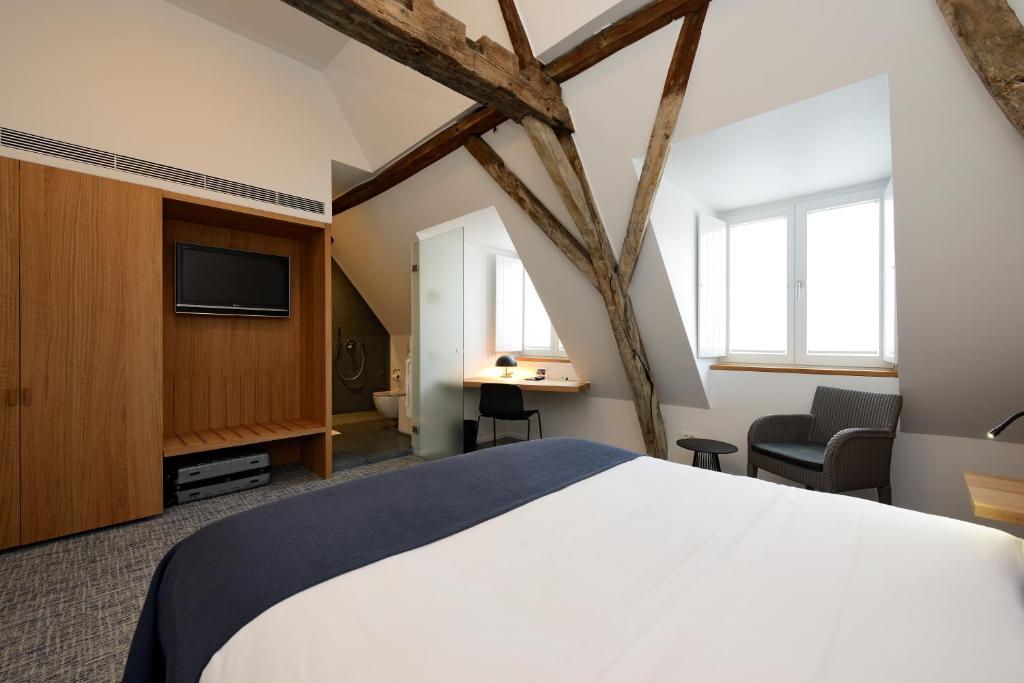 TV a/nebo společenská místnost v ubytování Hotel Messeyne