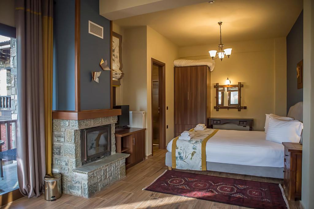 Postel nebo postele na pokoji v ubytování Pandion Luxury Boutique Hotel & Suites with Spa