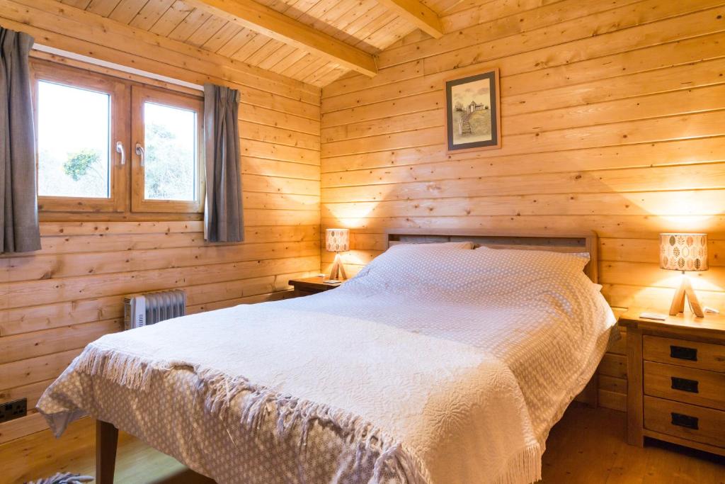 A bed or beds in a room at Oakbank Farm