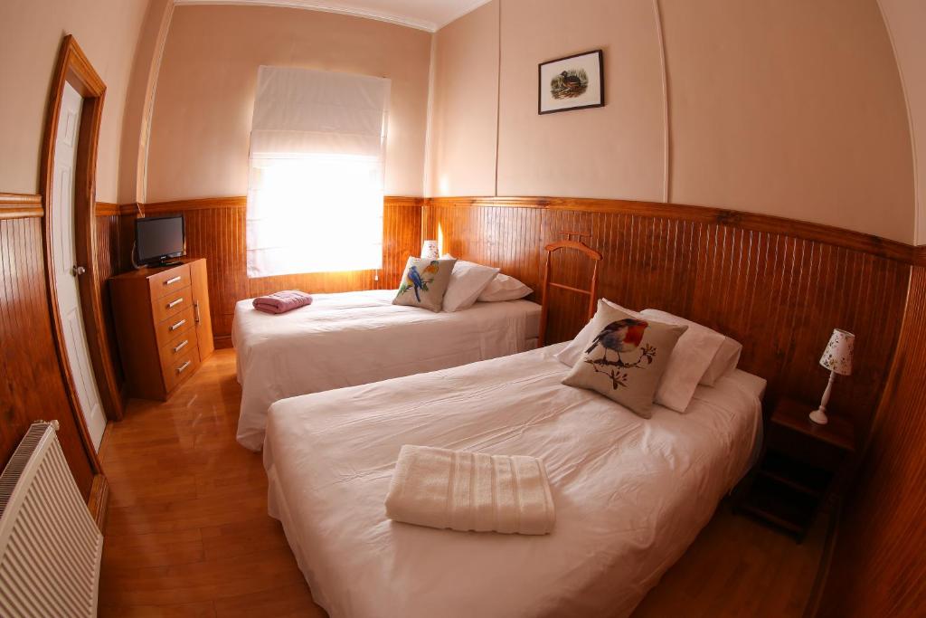 Postel nebo postele na pokoji v ubytování Hotel Albatros