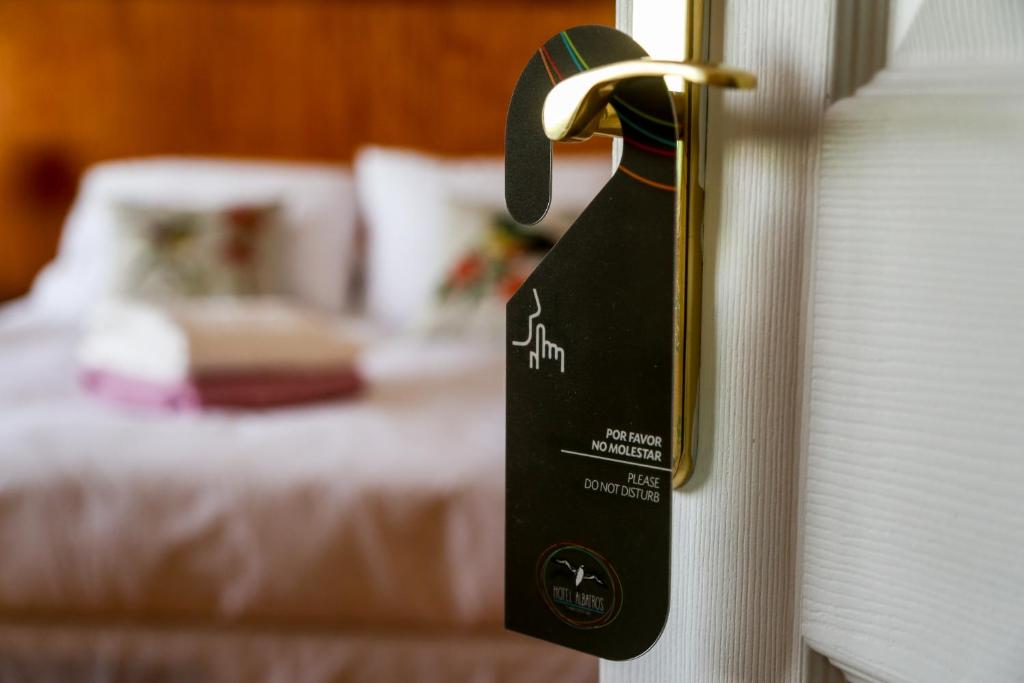 Postel nebo postele na pokoji v ubytování Hotel Albatros