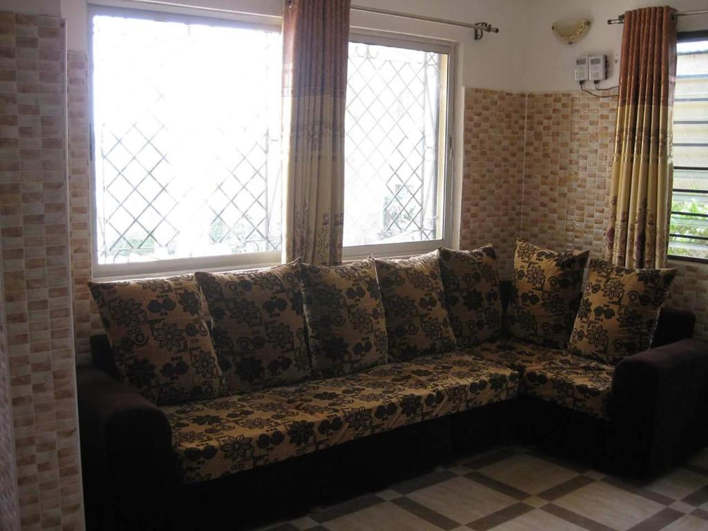 Posezení v ubytování Golden Guest House- Miritini