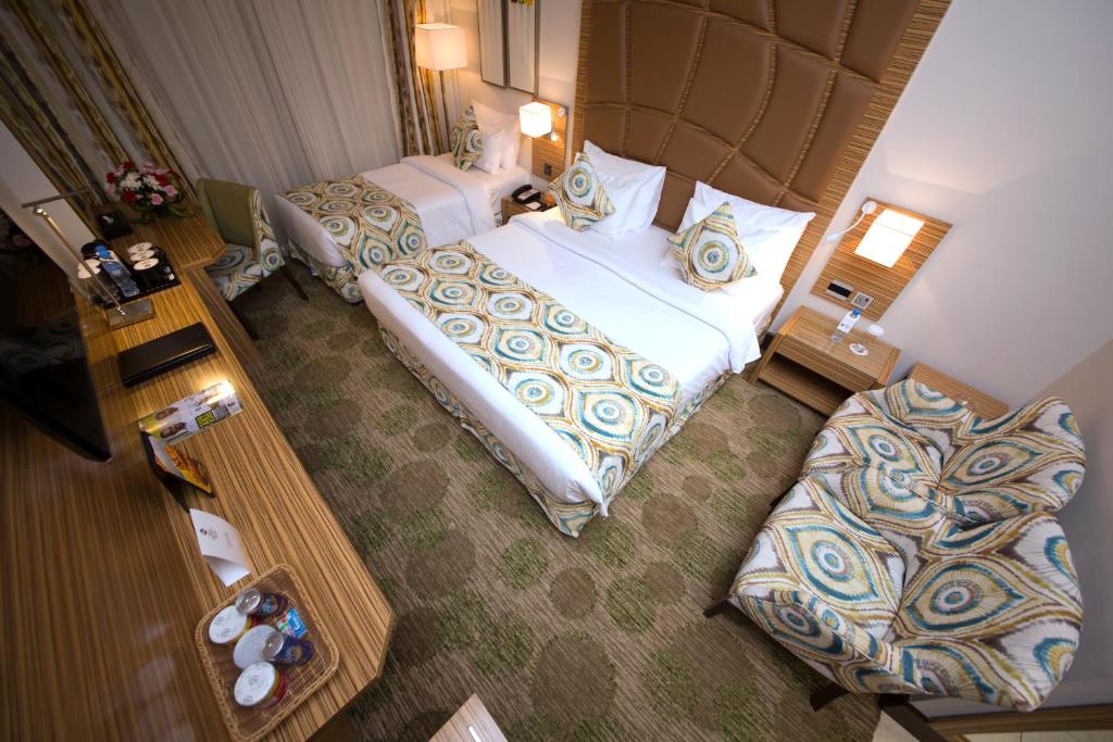 Postel nebo postele na pokoji v ubytování Best Western Plus Pearl Creek