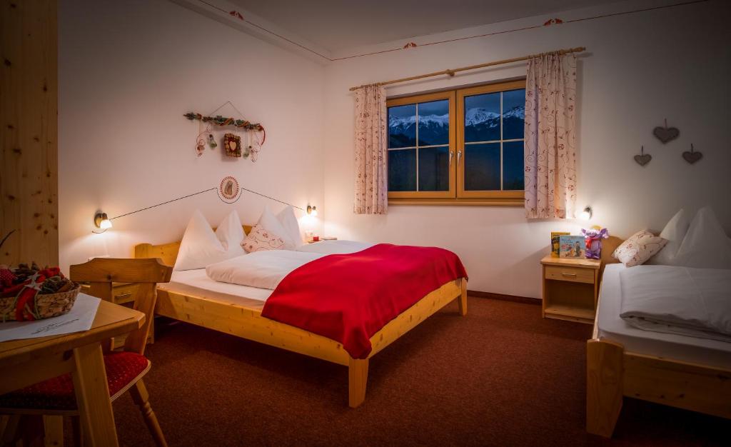Postel nebo postele na pokoji v ubytování Appartementhaus Speckalm