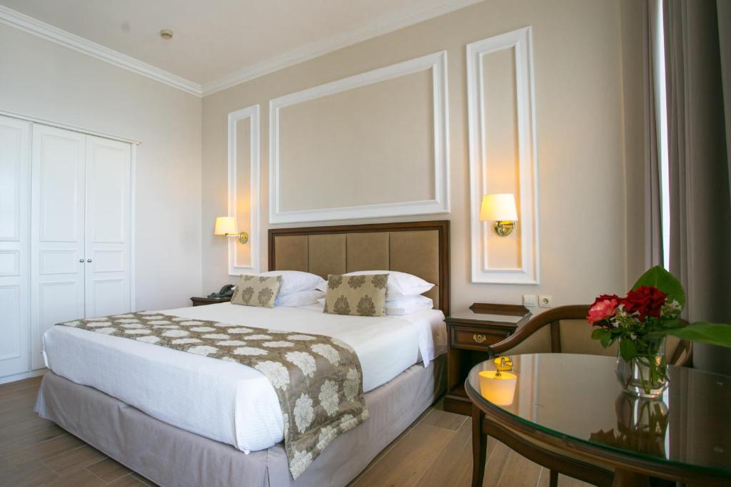 Postel nebo postele na pokoji v ubytování Thermae Sylla Spa & Wellness Hotel